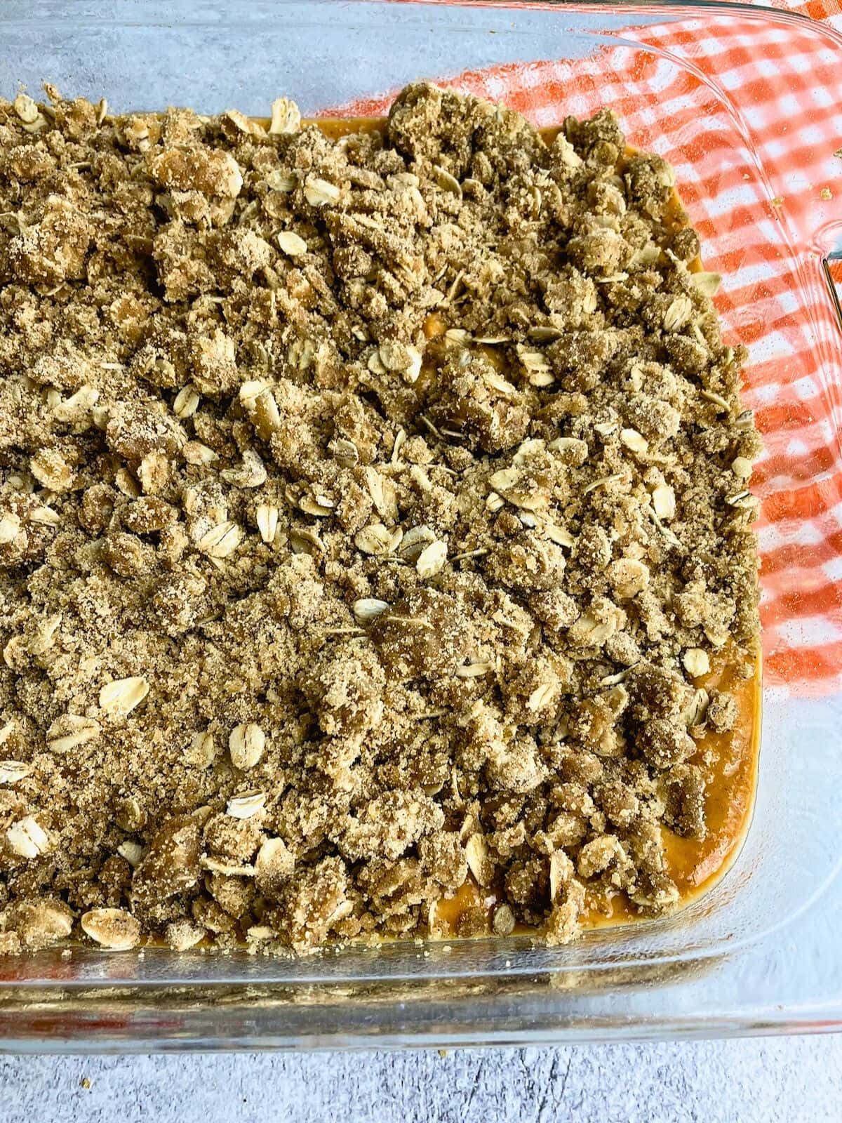 Crisp topping sprinkled over the top of the pumpkin pie filling.