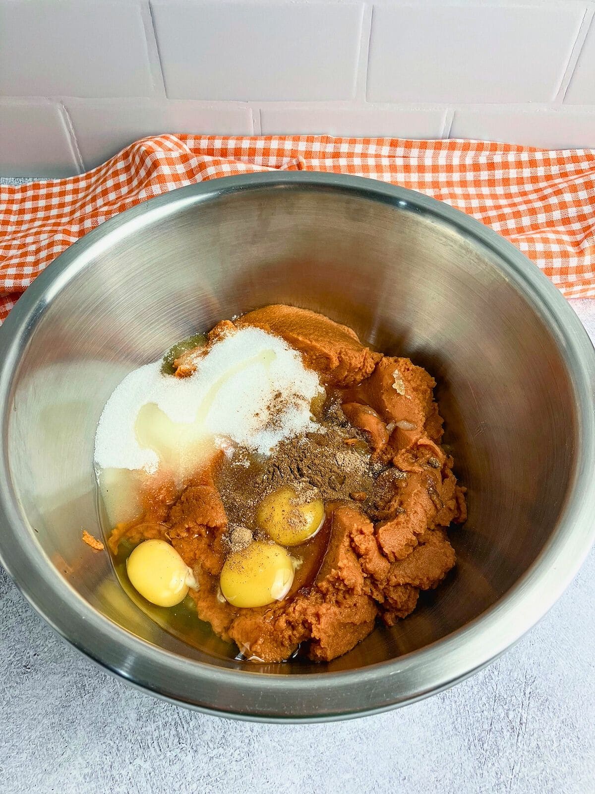 Eggs, sugar, and spices were added to the pumpkin puree.