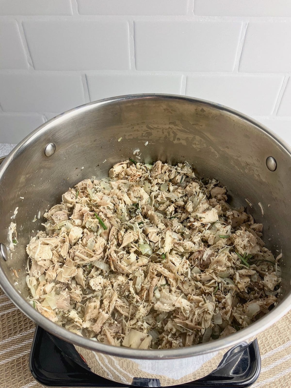 Turkey and vegetable mixture is cooked.