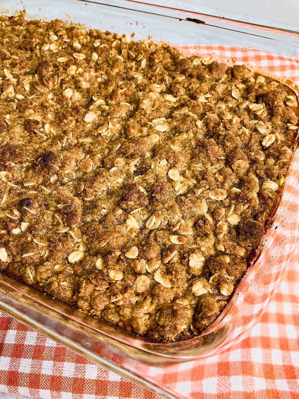 A baking dish of homemade pumpkin crisp.