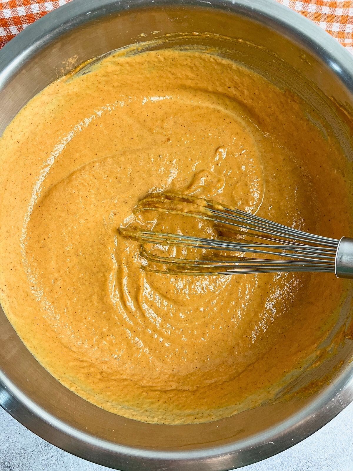 Cream mixed into the pumpkin puree filling.
