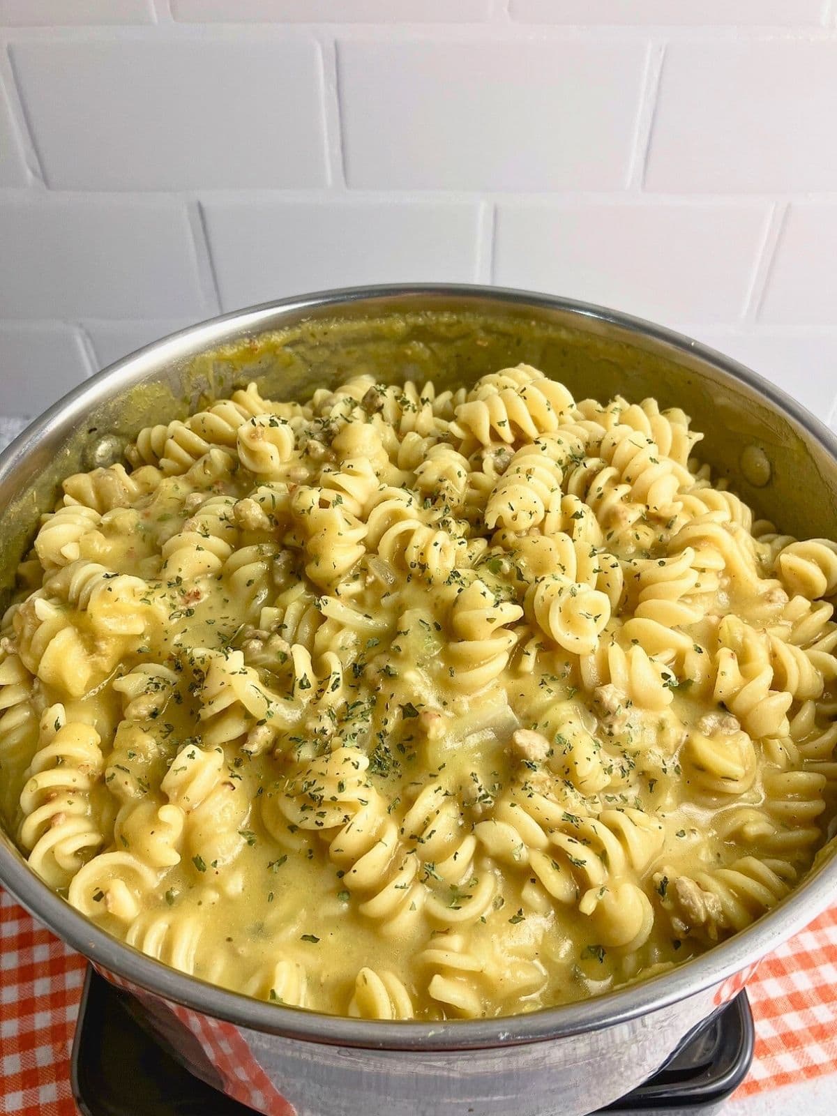 A large pot of homemade pumpkin pasta.