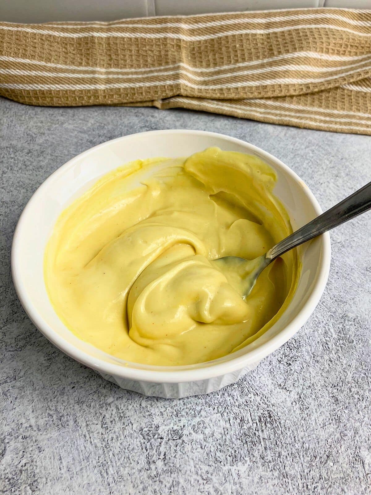 Slider sauce mixed together in a small white mixing bowl.