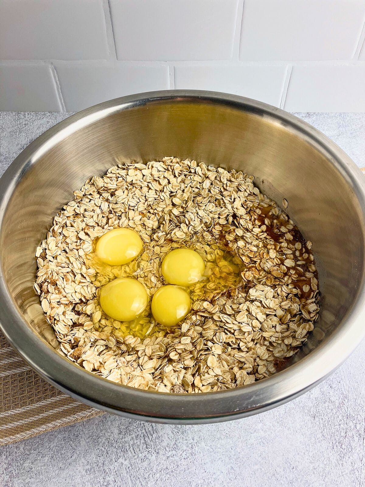 Wet ingredients are added to the dry ingredients.