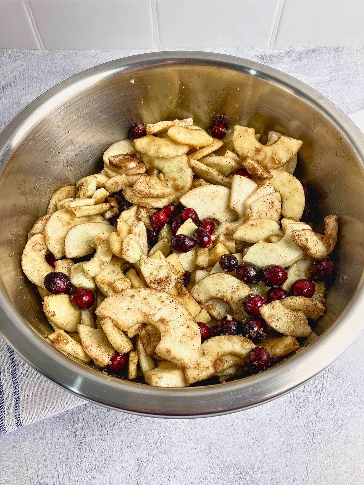 Apple and cranberry filling mixed together.