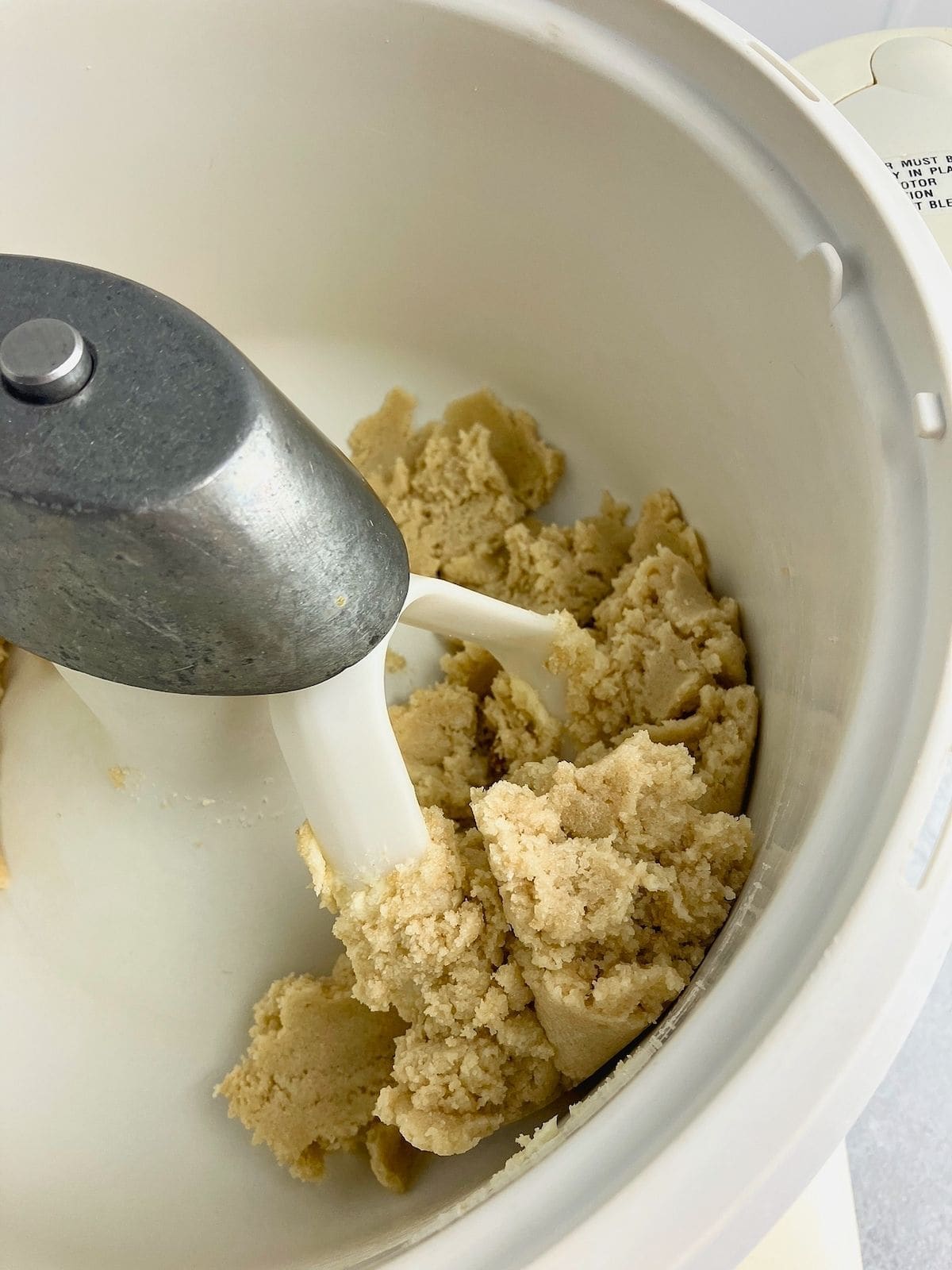 Butter and sugar are creamed together.