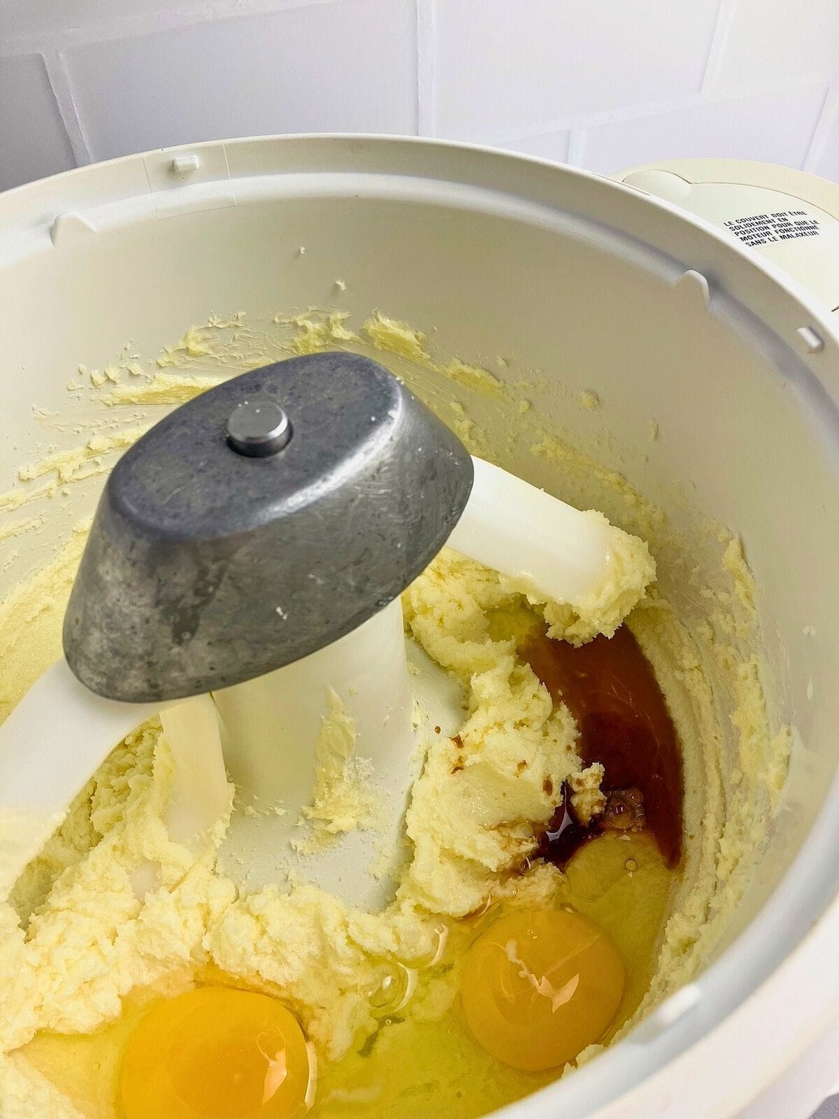 Eggs and vanilla were added to the creamed butter mixture.