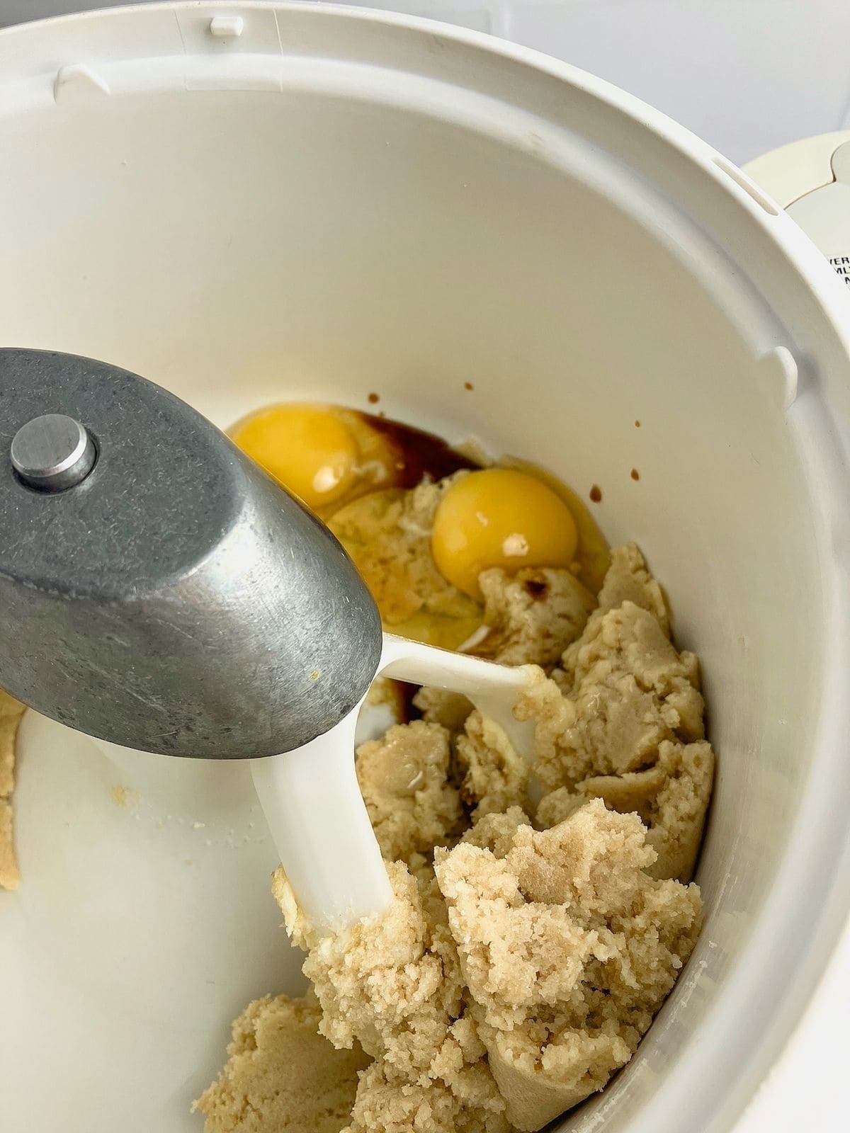 Eggs and vanilla were added to the creamed butter mixture.
