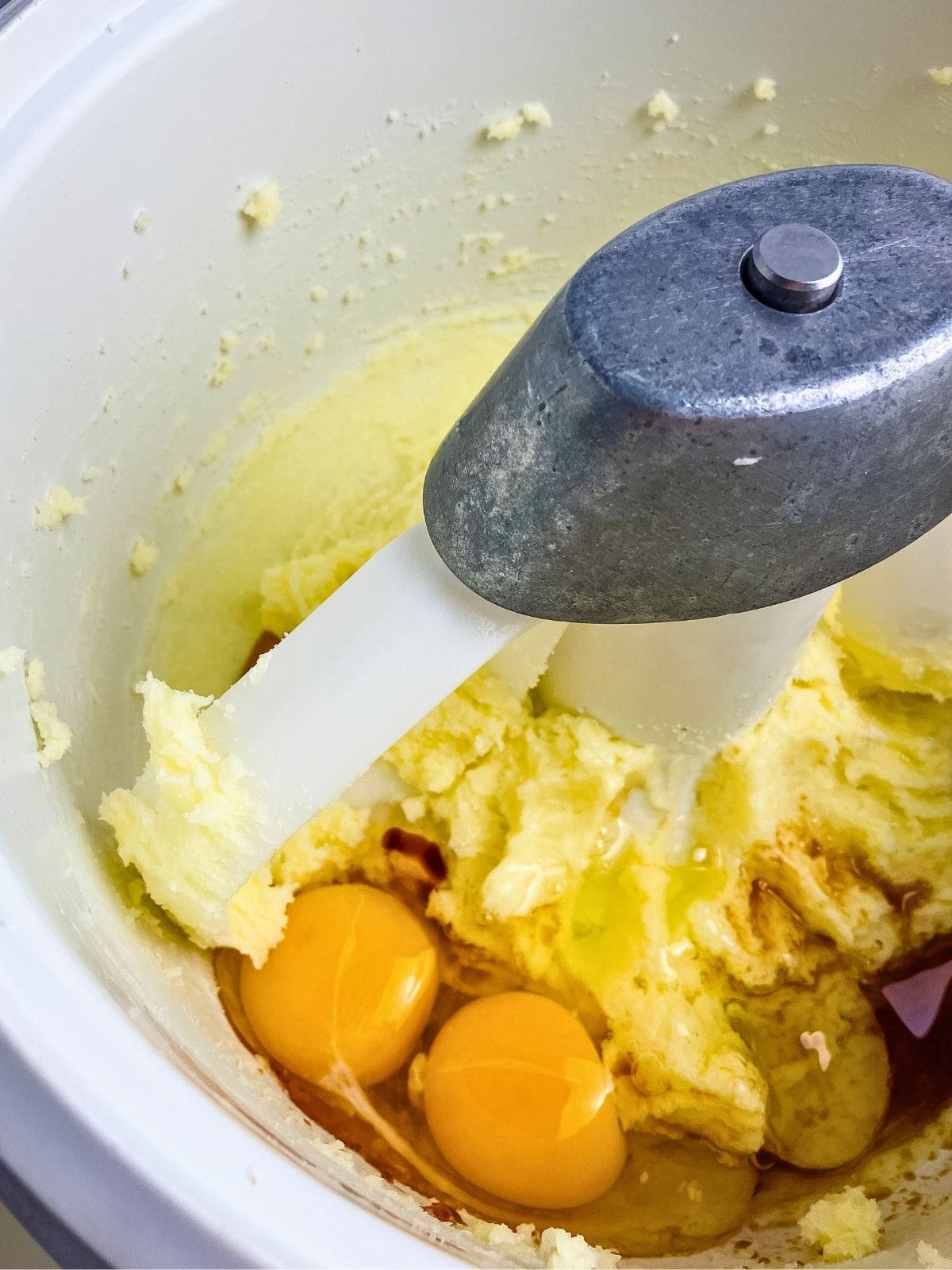 Eggs and vanilla extract were added to the mixer bowl.