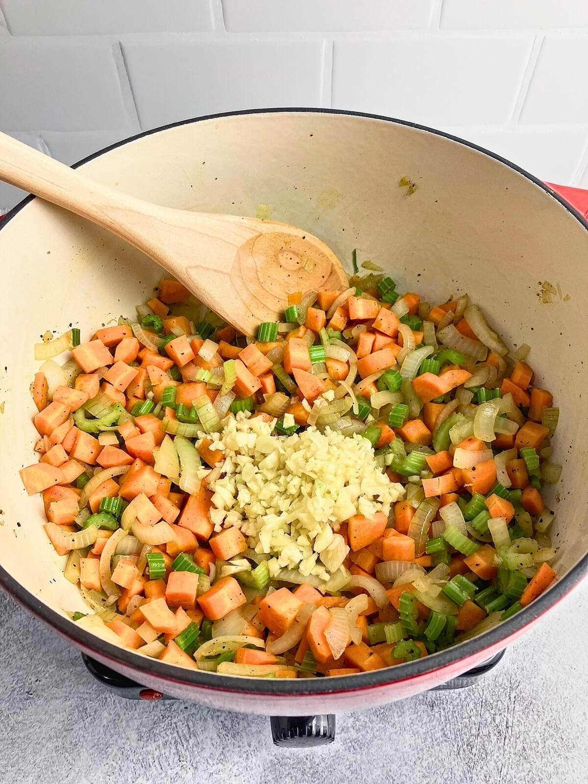Minced garlic was added to the sauteed vegetables.