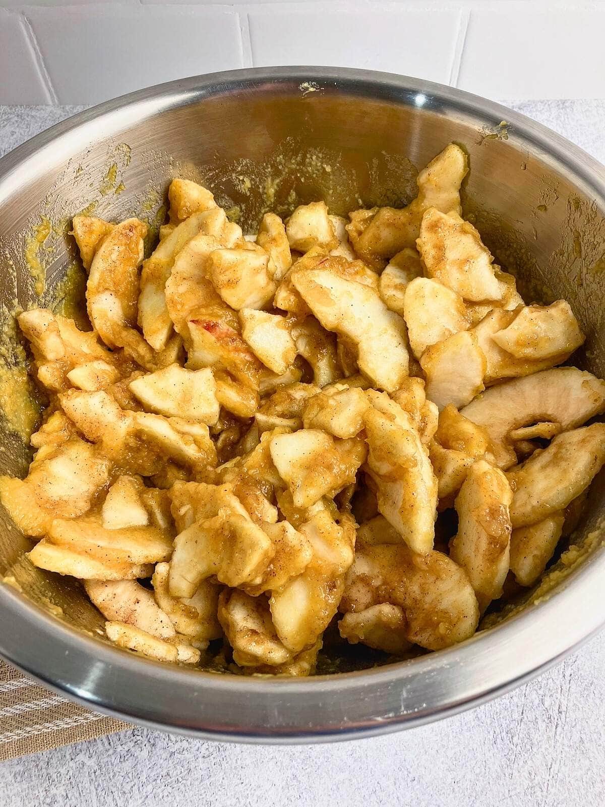 The spiced apples were mixed with the pumpkin puree.