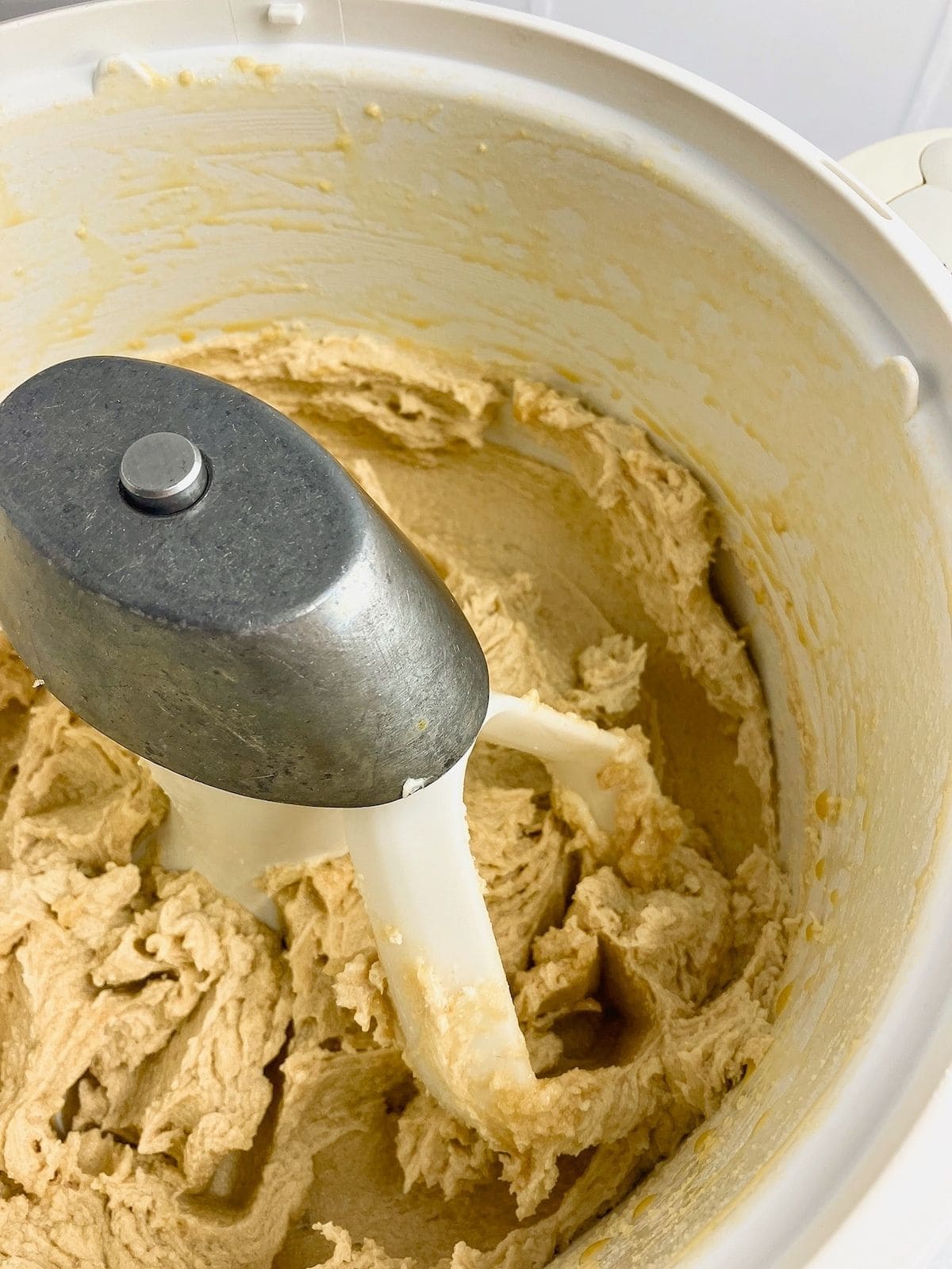 Wet ingredients are mixed into the creamed butter mixture.