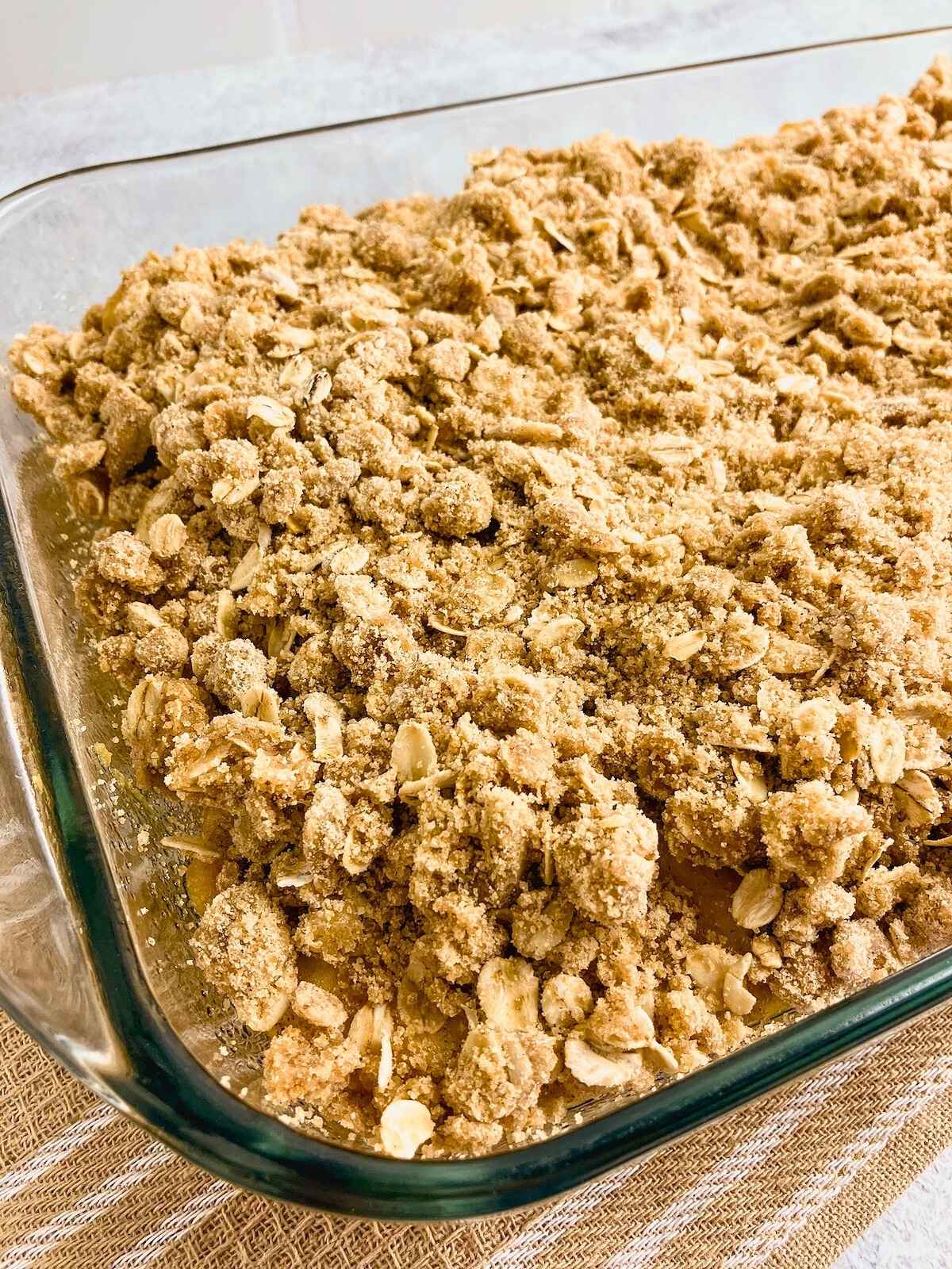 Oat topping sprinkled over top of the apple and pumpkin filling.