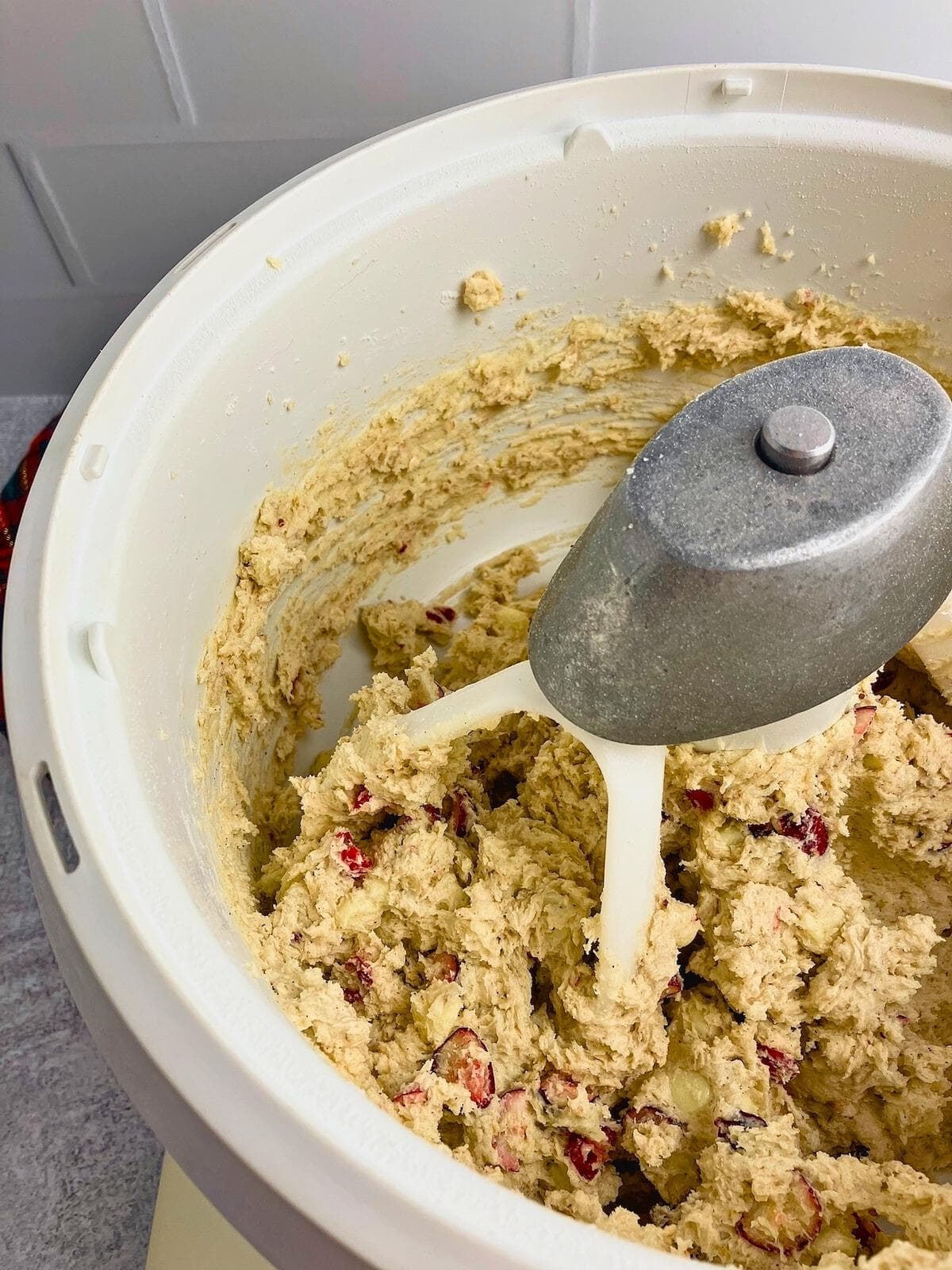 Cranberries and white chocolate are mixed into the dough.