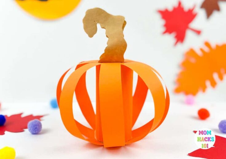 3D pumpkin craft made from toilet paper roll tubes.