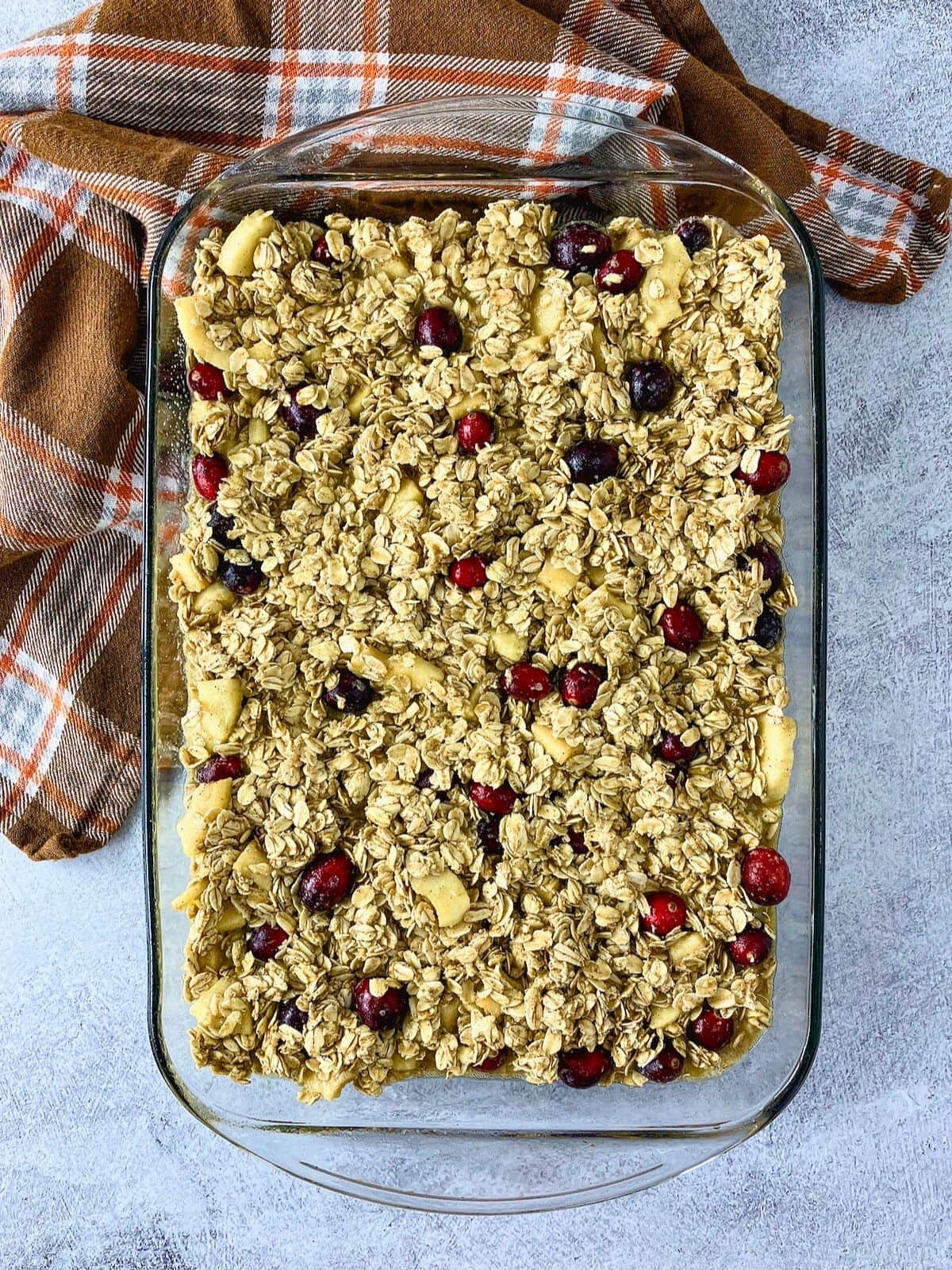The cranberry apple oatmeal batter was poured into the baking dish.