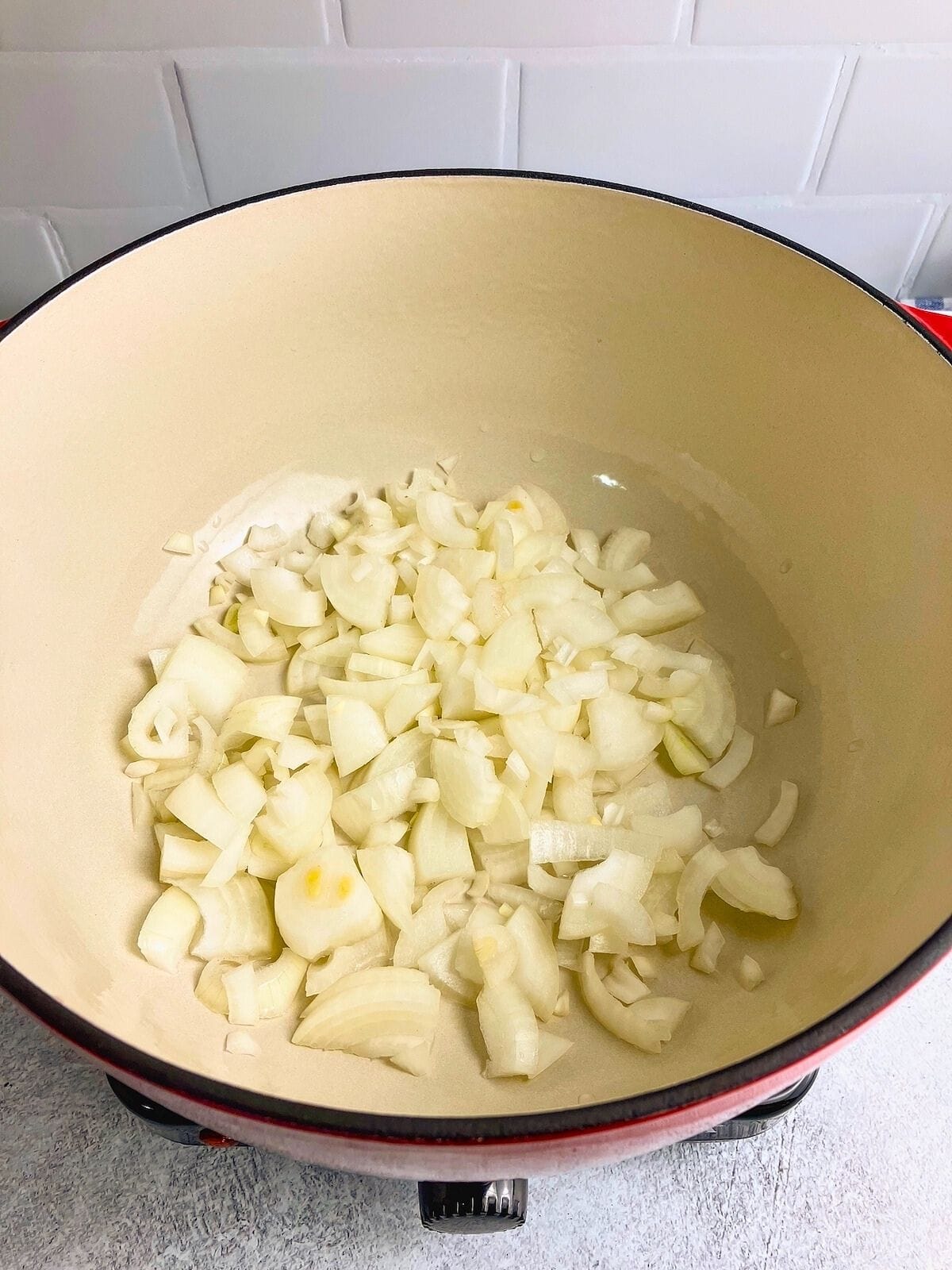 Chopped onions were added to the pot.