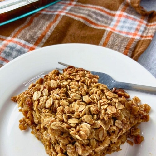 A slice of homemade gingerbread baked oatmeal on a plate.