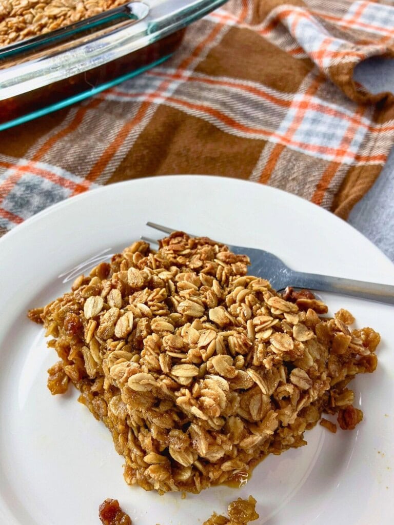 A slice of homemade gingerbread baked oatmeal on a plate.