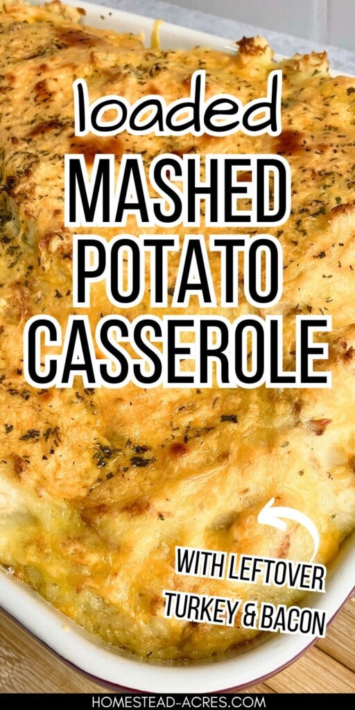 Cheese potato casserole in a red and white baking dish. The text overlay says Loaded Mashed Potato Casserole With Leftover Turkey And Bacon.