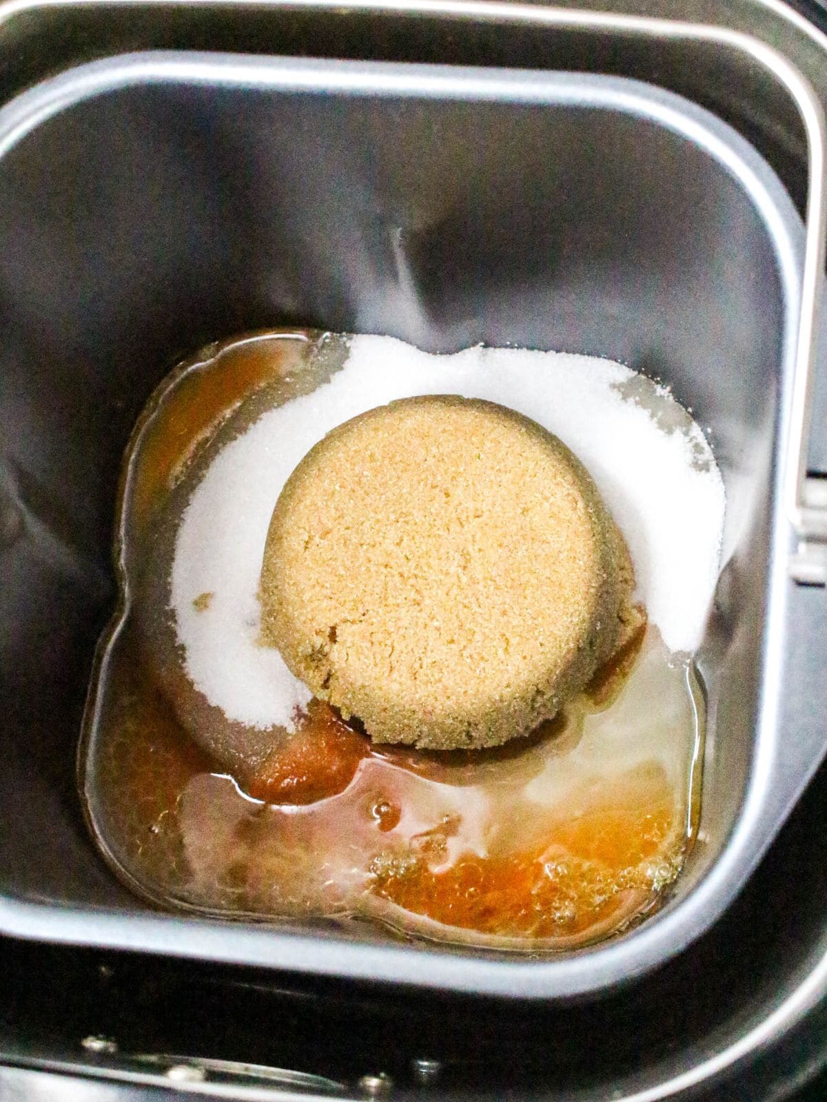 The white and brown sugar were added to the wet ingredients.