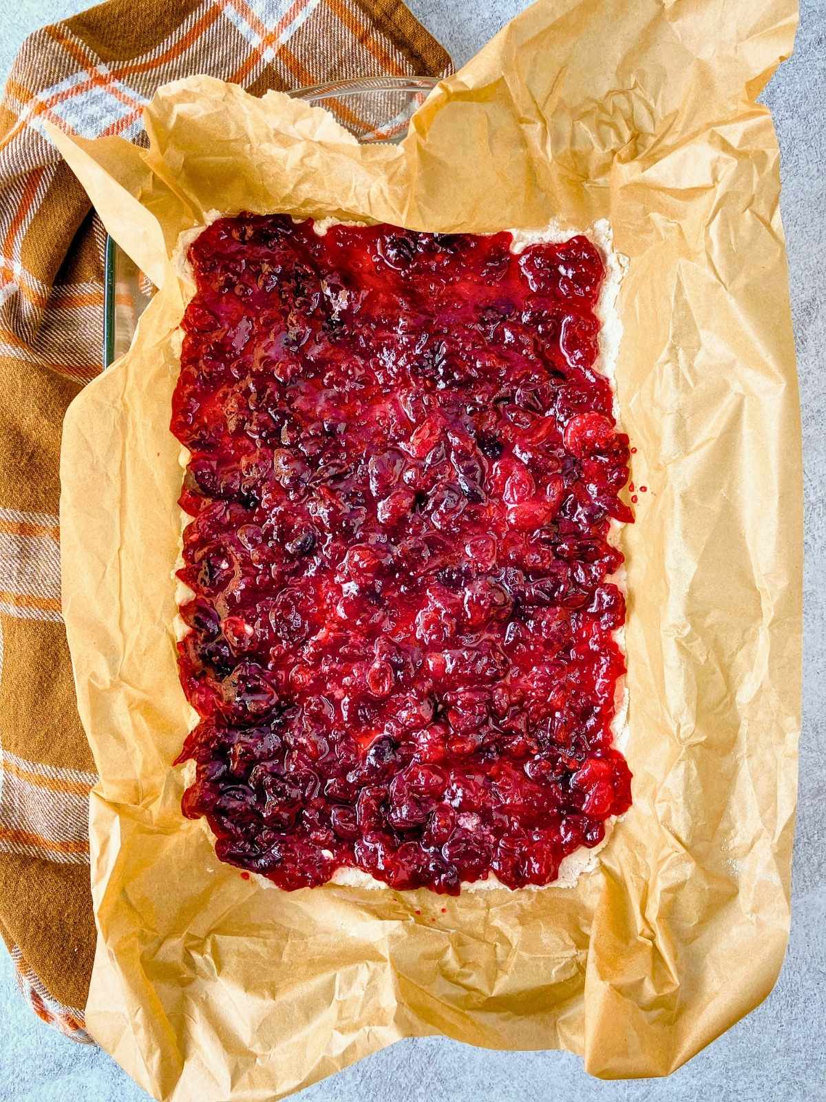 Homemade cranberry sauce was spread over top of the crust layer.