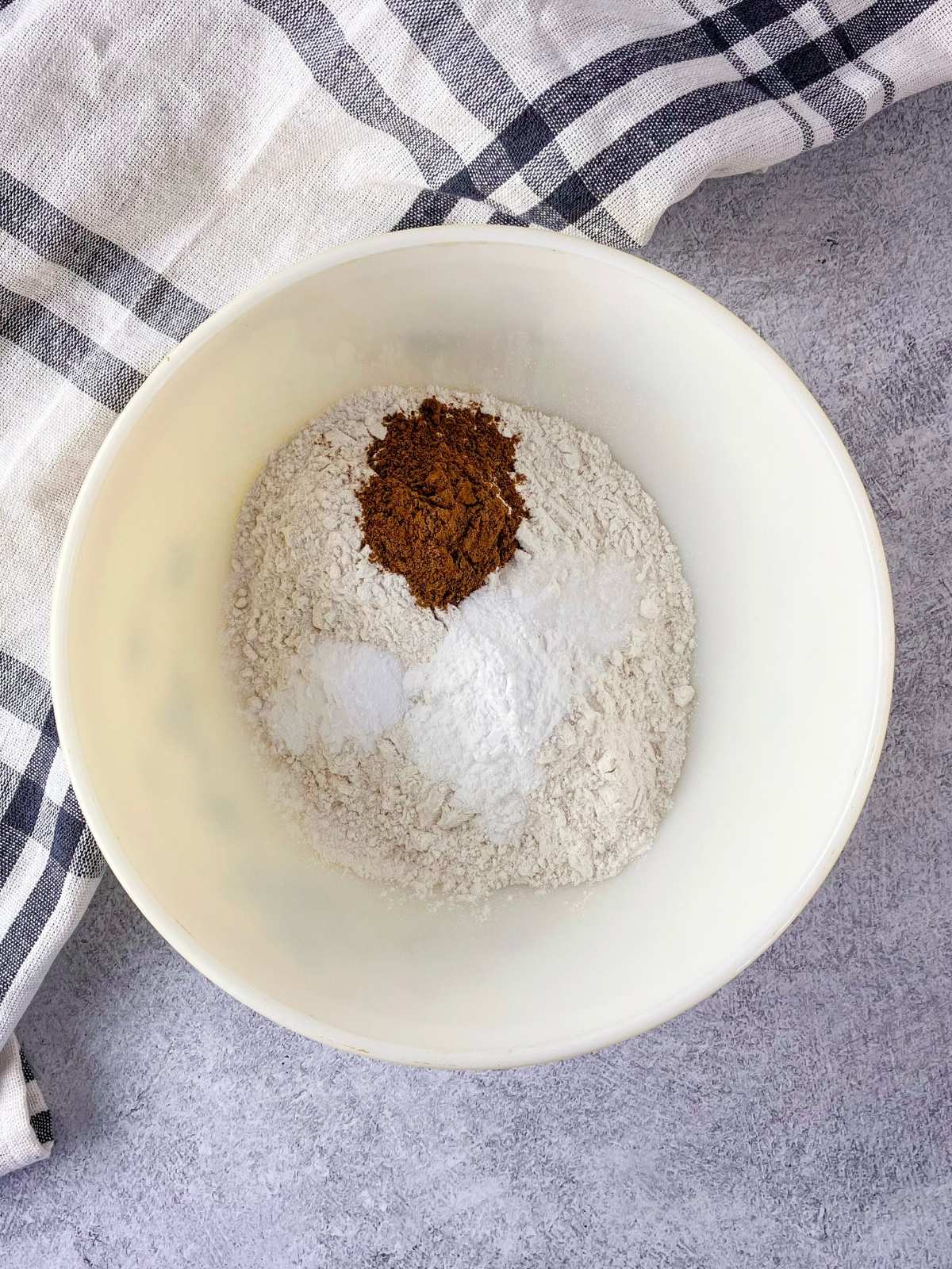 The dry ingredients for the bread are in a medium mixing bowl.