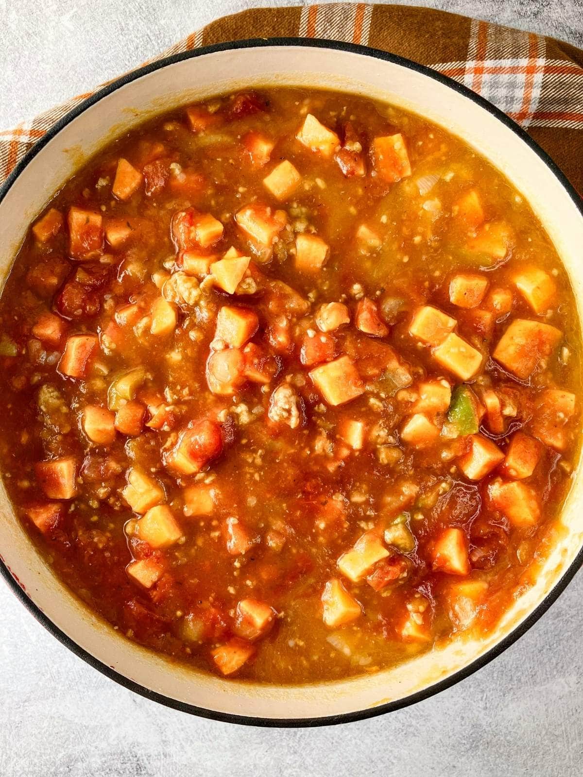 Easy homemade pumpkin sweet potato chili in a large pot.