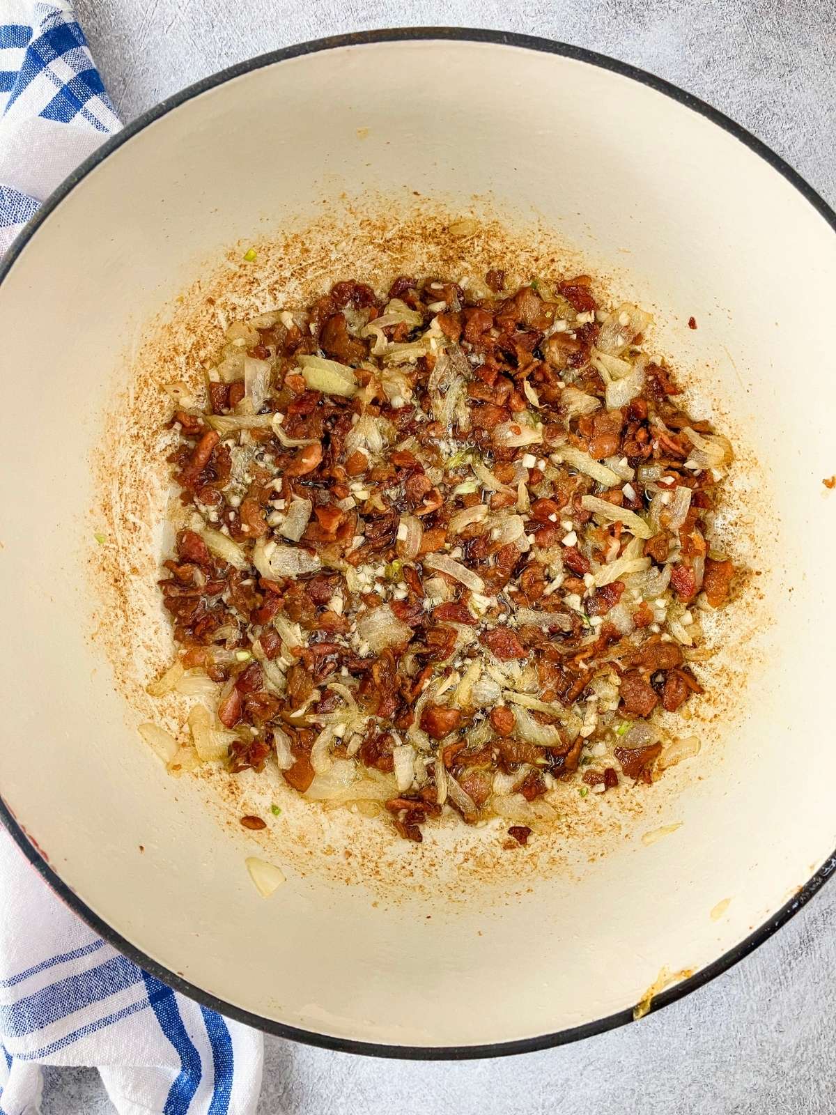 Garlic, caramelized onions, and bacon cooked together.