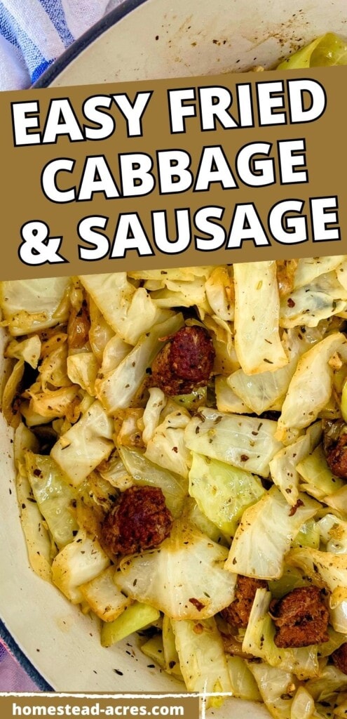 Cooked cabbage, onions, and sausage in a large Dutch oven. The text overlay says Easy Fried Cabbage And Sausage.