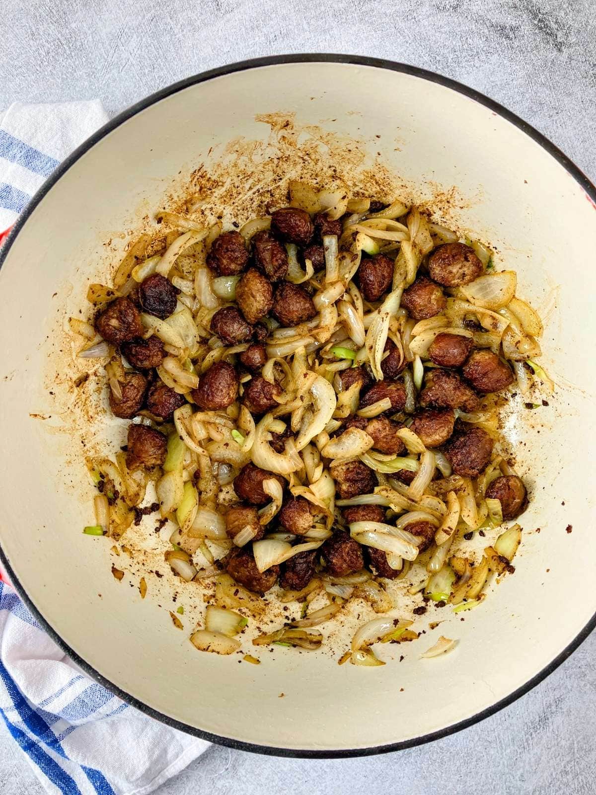 Caramelized onions, garlic, and sausage cooked and mixed together.