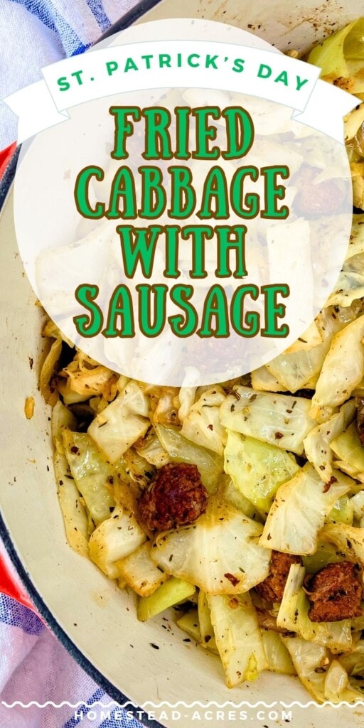 Cooked cabbage and sausage in a large Dutch oven. The text overlay says St Patrick's Day Fried Cabbage With Sausage.