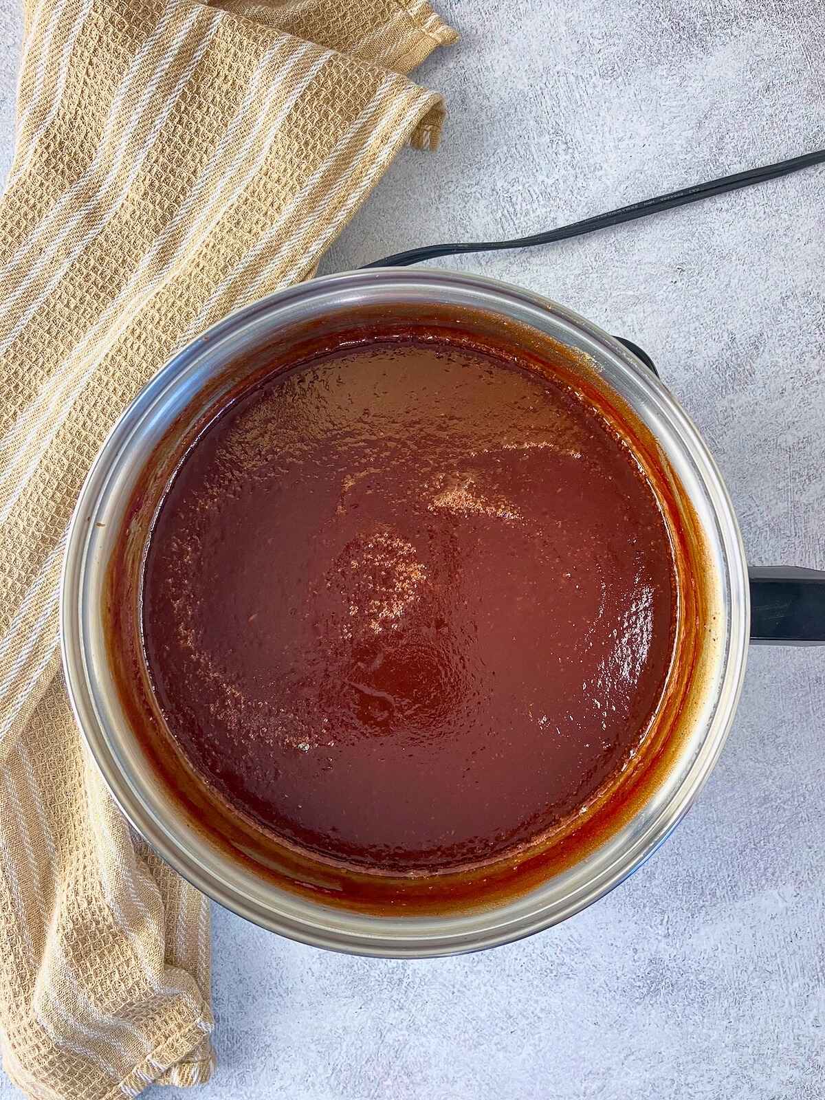 The BBQ sauce has finished cooking.