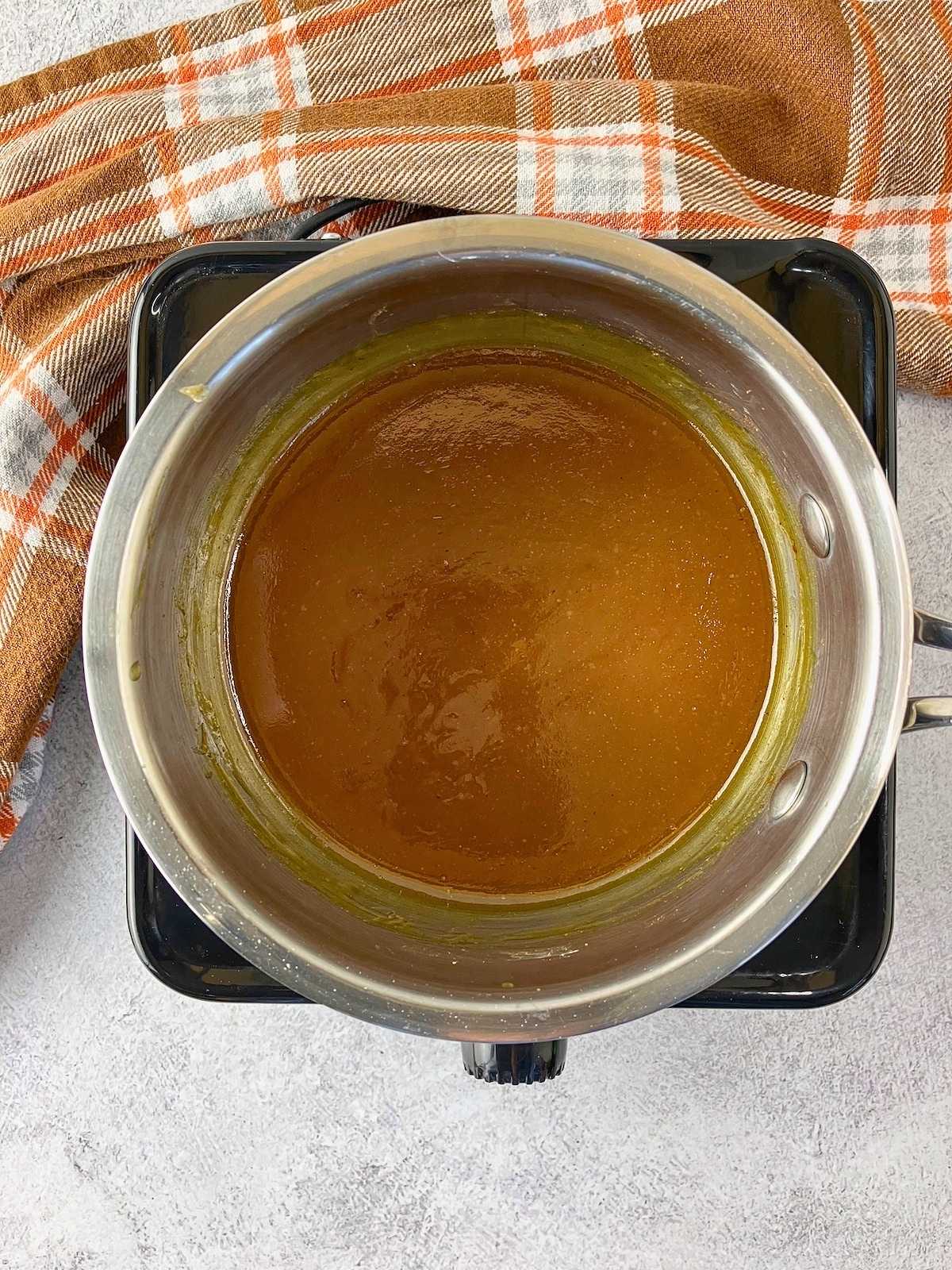 The brown sugar ham glaze is thickened after cooking.