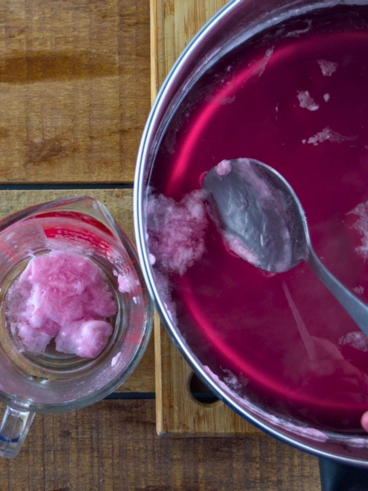 Skimming the foam off the jelly.