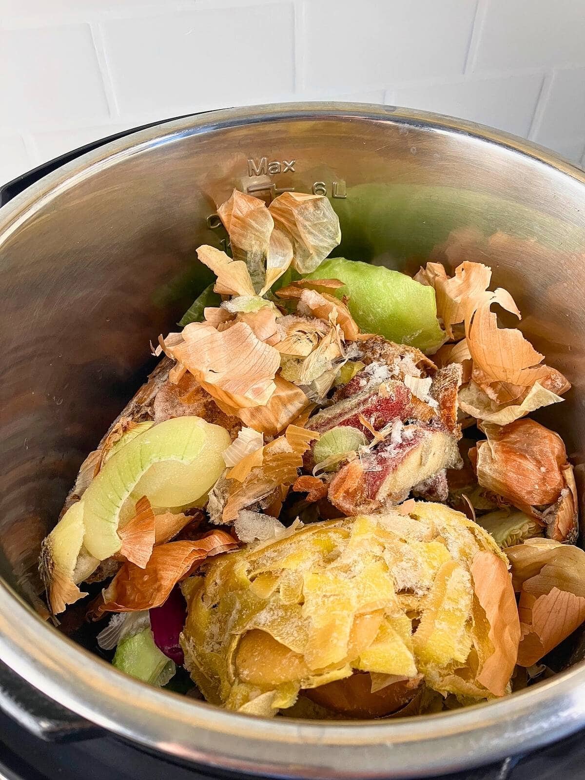 Frozen vegetable scraps in the Instant Pot.