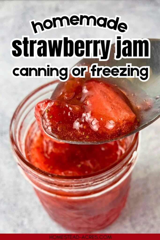 A spoonful of strawberry jam is held over an open jar. The text overlay reads "Homemade Strawberry Jam Canning Or Freezing."