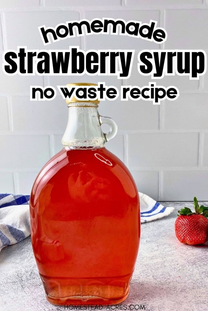 A jar of strawberry syrup sitting on the counter next to a strawberry. The text overlay says Homemade Strawberry Syrup No Waste Recipe.