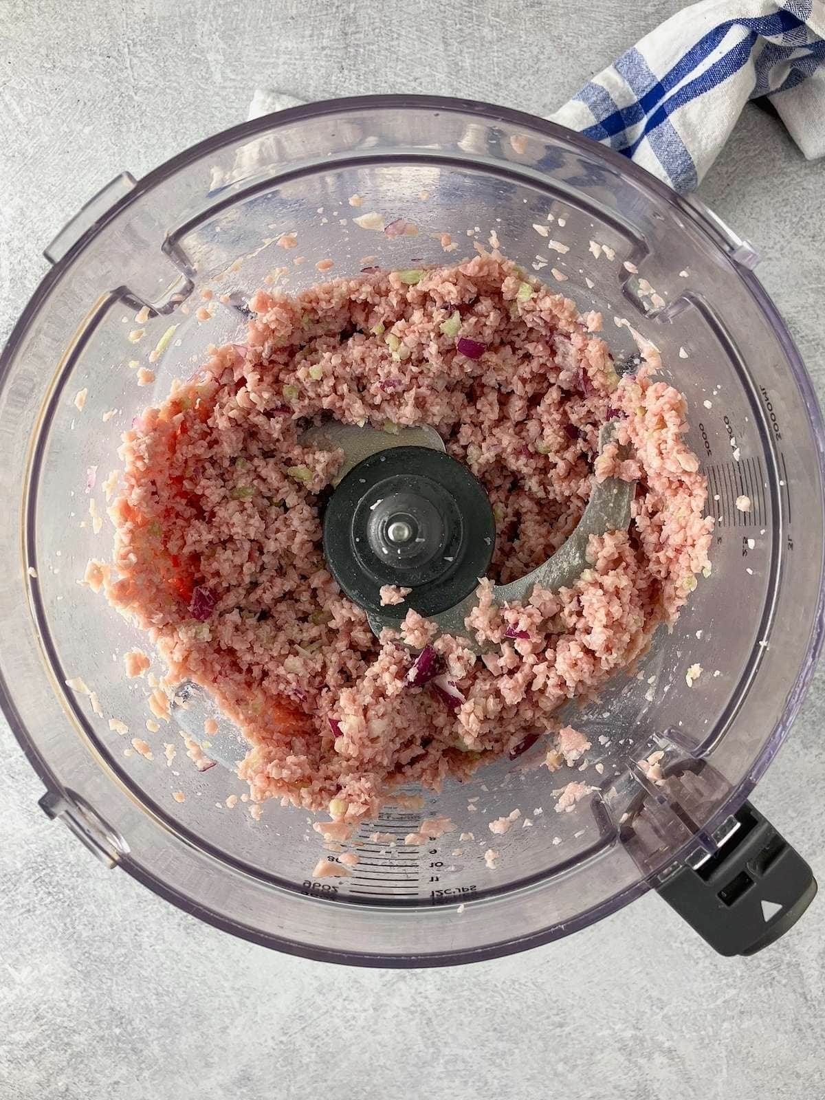 The ham, onion, and celery mixture after mincing in a food processor.