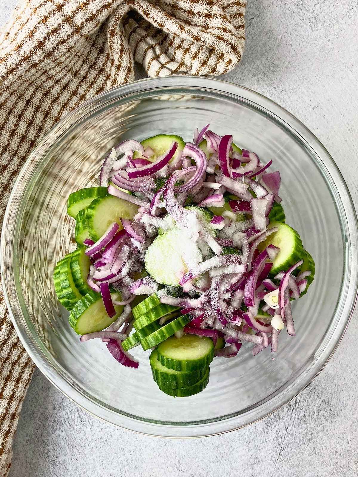 Salt was added to the sliced vegetables.