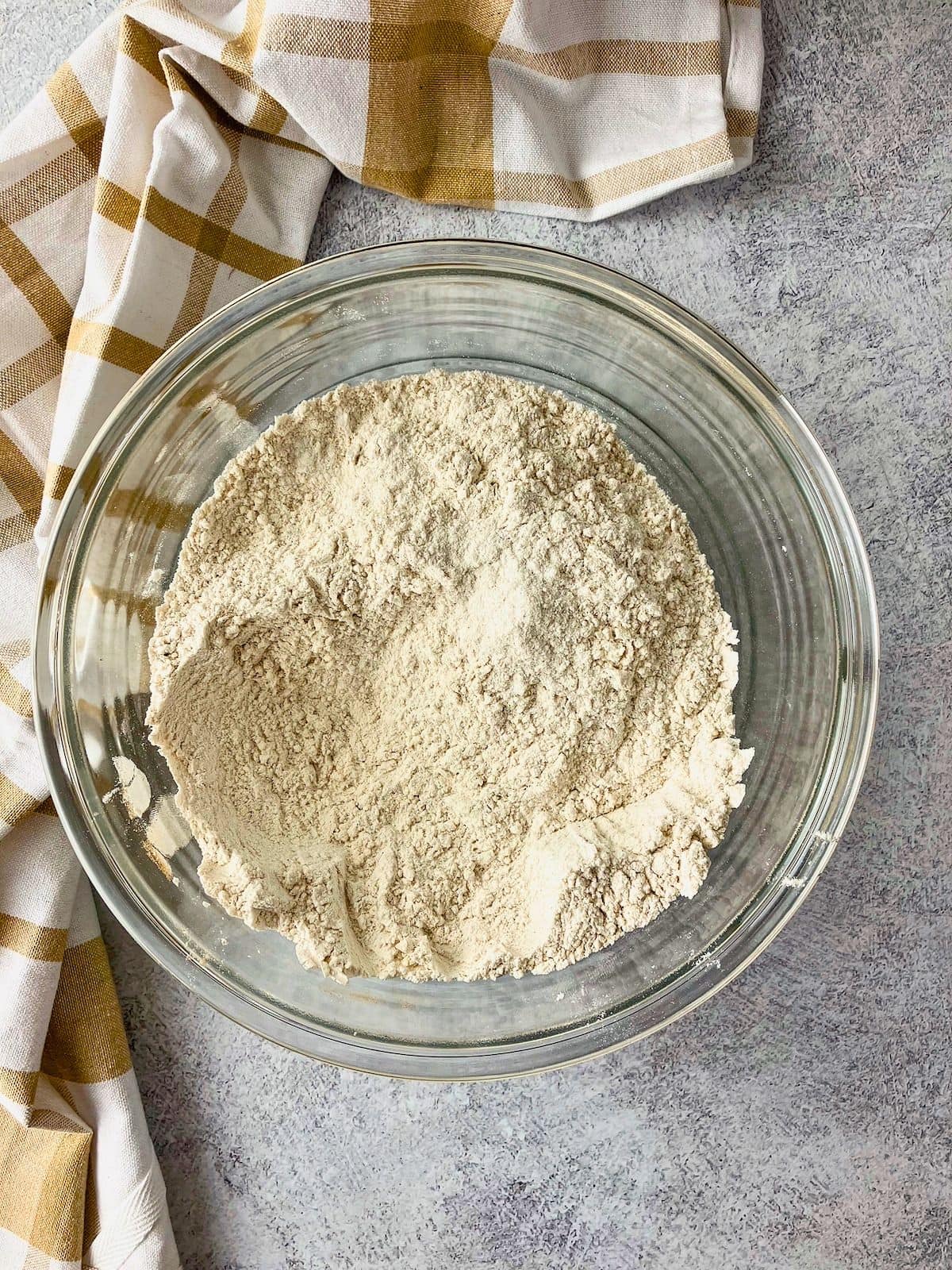 Dry flour mixture in a glass bowl for the topping.