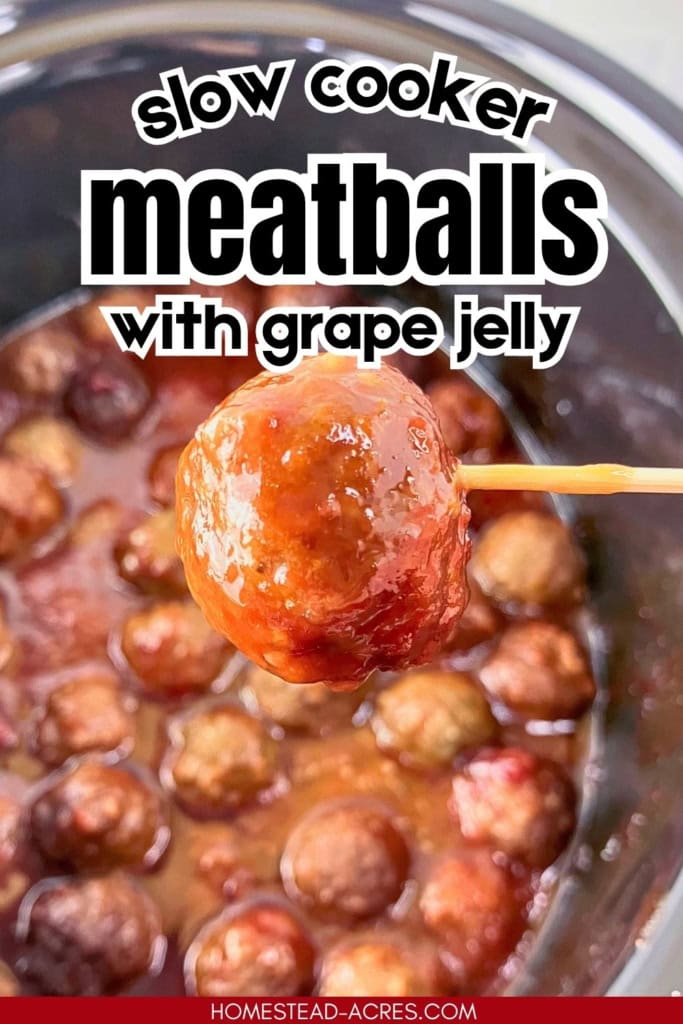 Crockpot meatballs with grape jelly coated in a glossy sauce with one meatball lifted on a toothpick above the crockpot. Text reads "slow cooker meatballs with grape jelly".